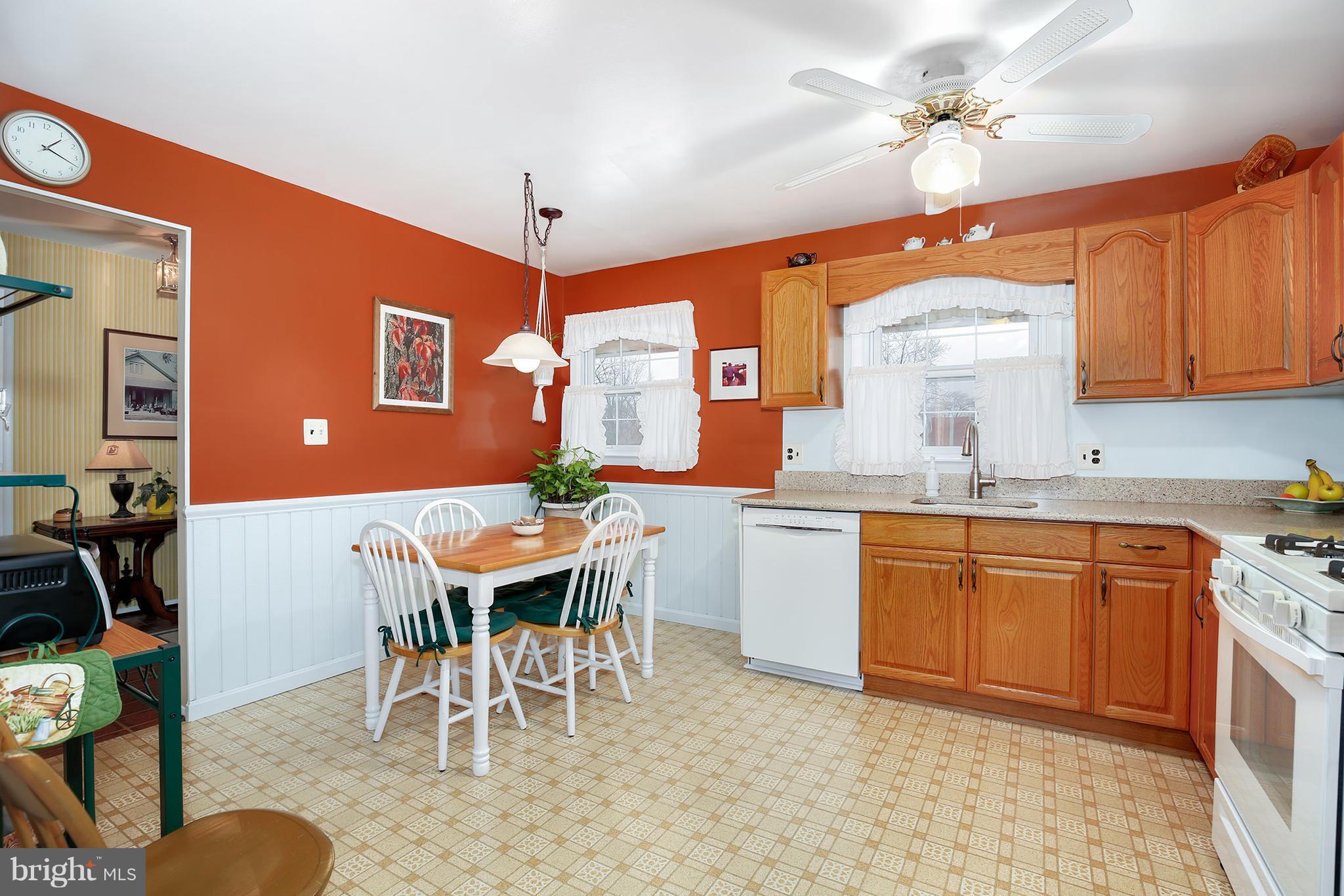 9007 Kilbride Road Baltimore, MD 21236 - Photo 10 of 30 a view of a dining room with furniture