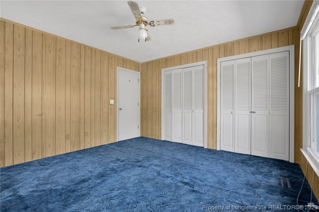 325 McIntosh Road Carthage, NC 28327 - Photo 16 of 30 a view of empty room with ceiling fan