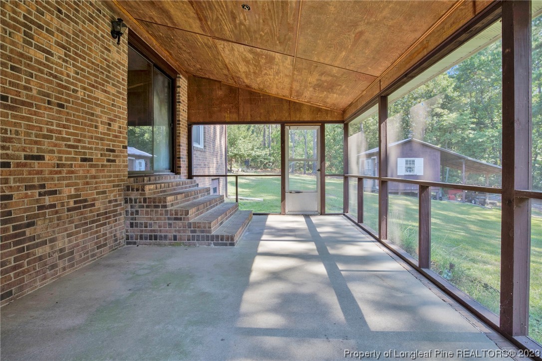 325 McIntosh Road Carthage, NC 28327 - Photo 19 of 30 a view of porch with a bench