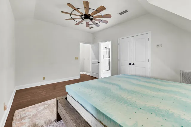 a view of a bathroom with bathtub and shower