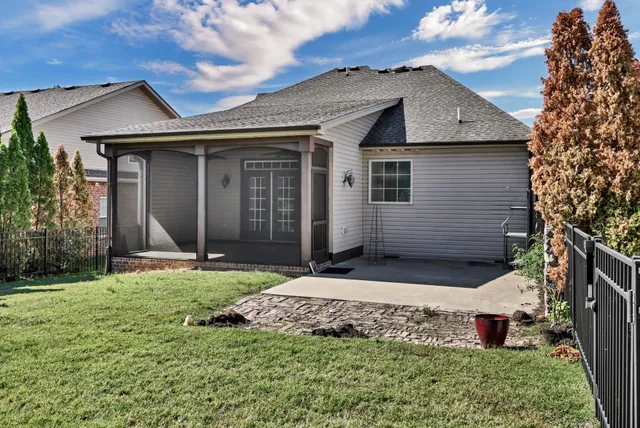 a view of a house with small yard