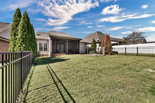 a view of a lake with a big yard
