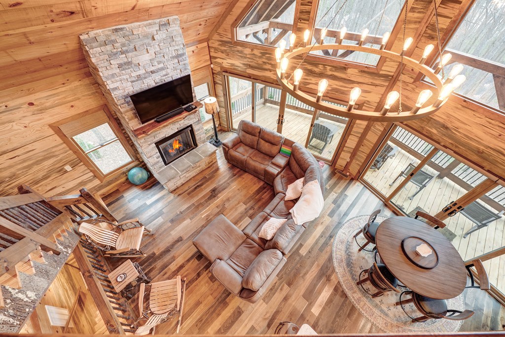1601 Shady Falls Road Blue Ridge, GA 30513 - Photo 34 of 78 a living room with a couch and a stove