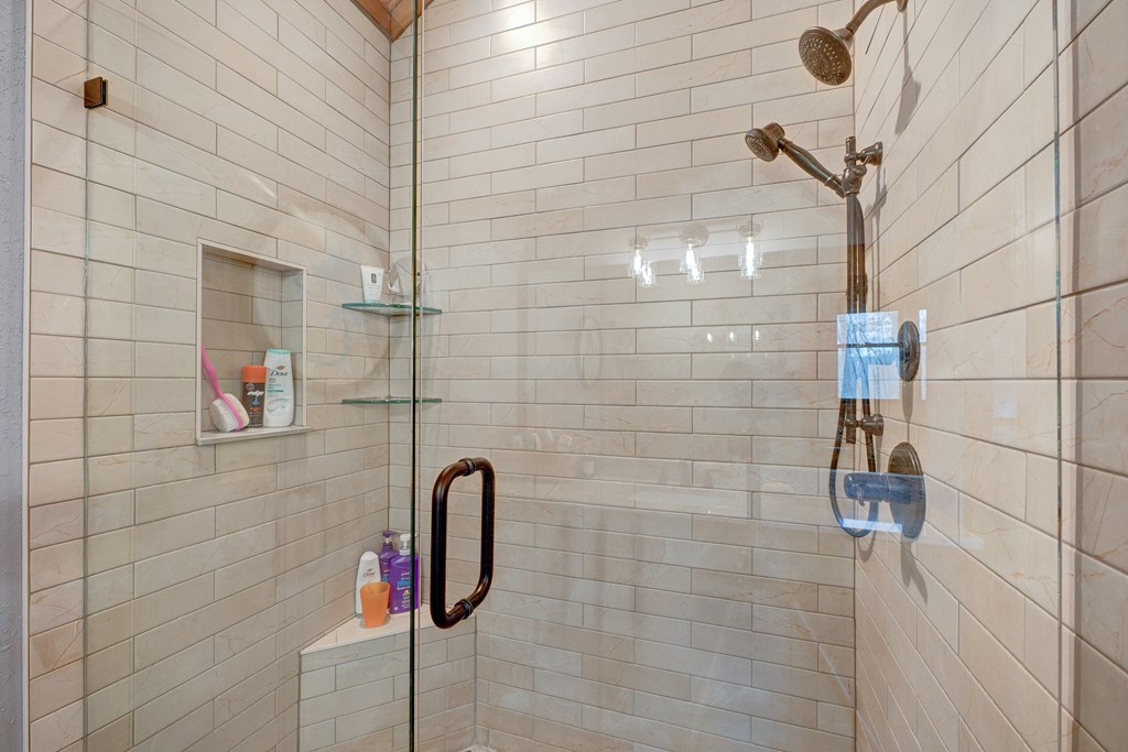 1601 Shady Falls Road Blue Ridge, GA 30513 - Photo 43 of 78 a bathroom with a shower