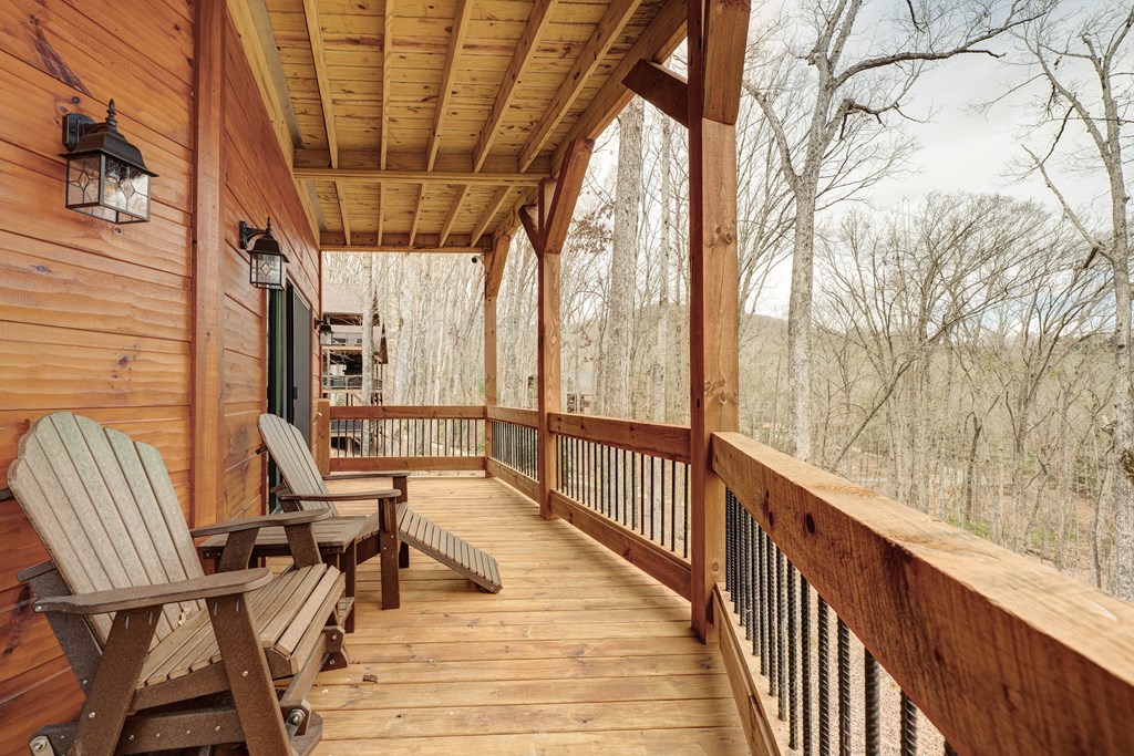1601 Shady Falls Road Blue Ridge, GA 30513 - Photo 58 of 78 a view of balcony with wooden floor and outdoor seating