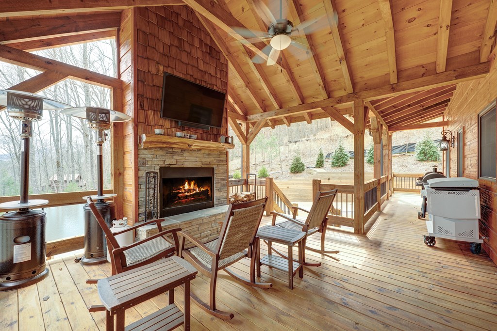 1601 Shady Falls Road Blue Ridge, GA 30513 - Photo 63 of 78 a building outdoor space with patio furniture and a fireplace