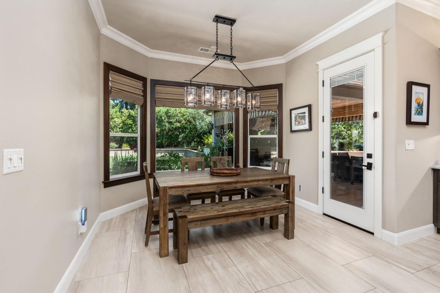 415 Heritage Avenue Clovis, CA 93619 - Photo 13 of 56 a living room with furniture and a large window