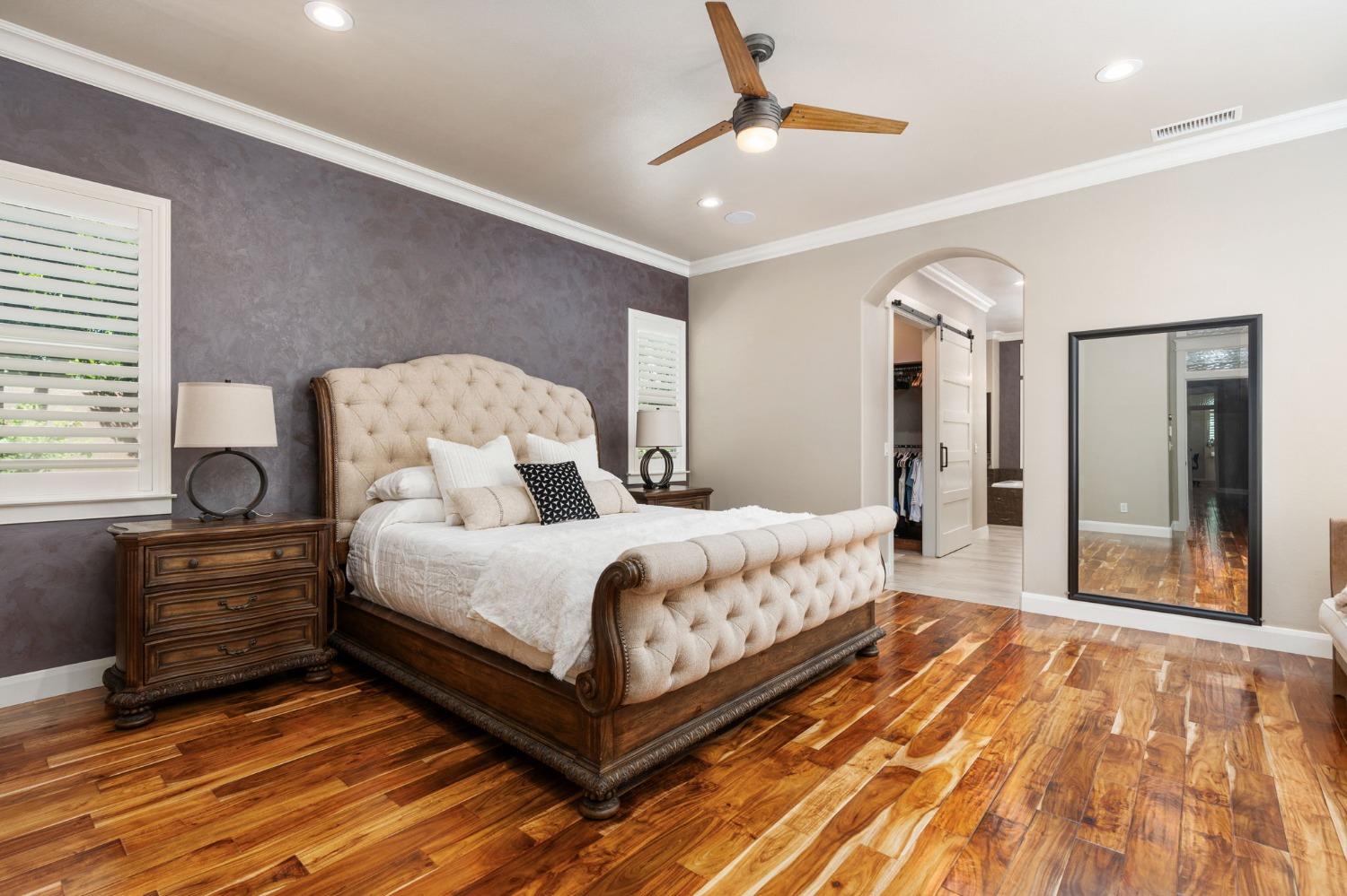 415 Heritage Avenue Clovis, CA 93619 - Photo 20 of 56 a large bedroom with bed dresser and a window