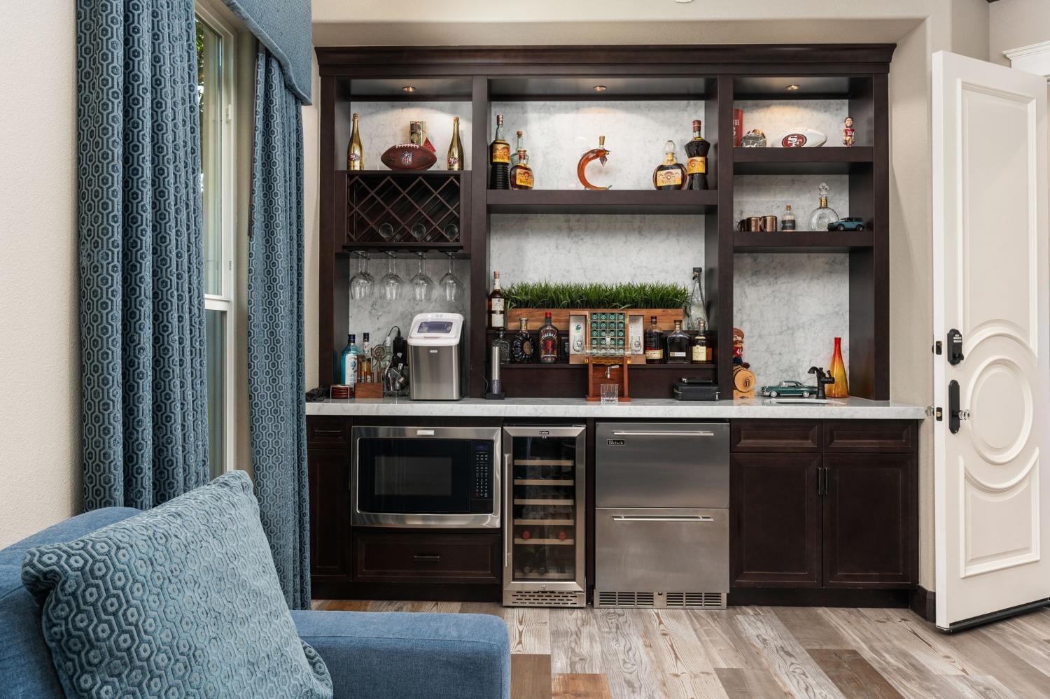 415 Heritage Avenue Clovis, CA 93619 - Photo 25 of 56 a kitchen with stainless steel appliances granite countertop a sink and cabinets