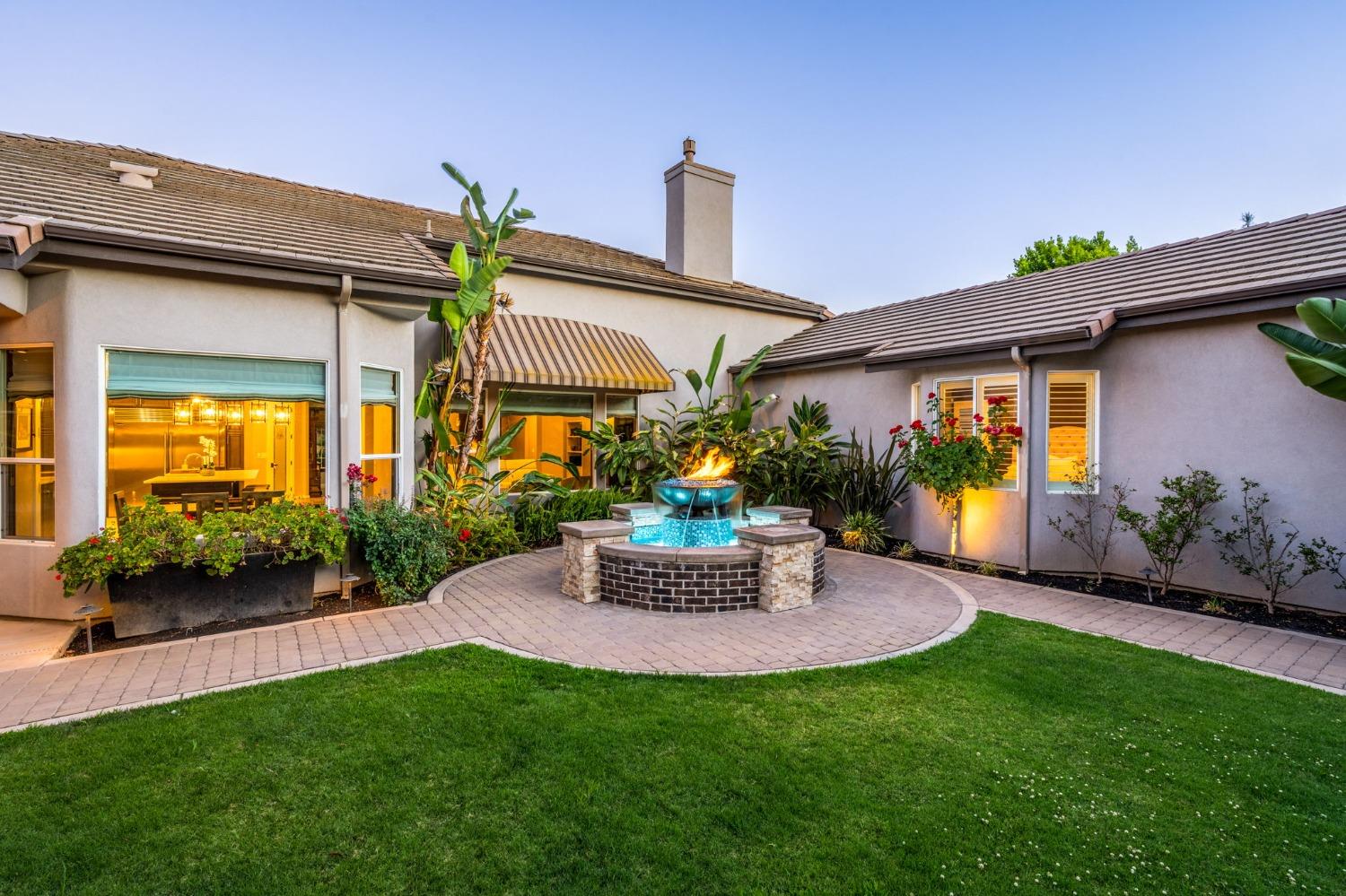 415 Heritage Avenue Clovis, CA 93619 - Photo 36 of 56 a view of a house with backyard and porch