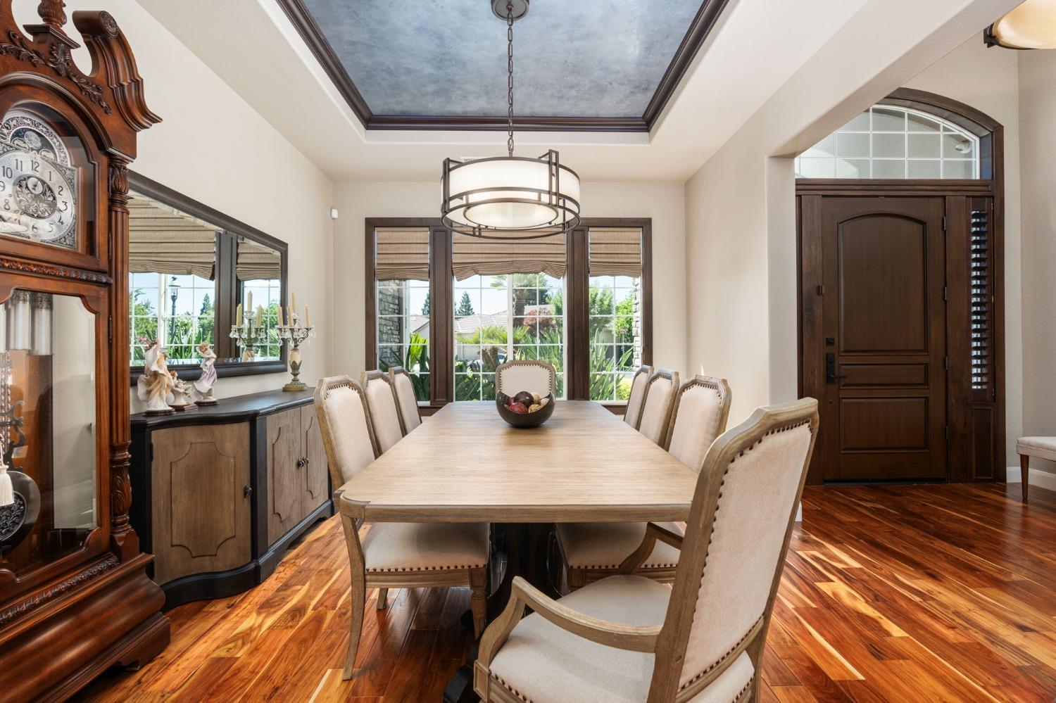 415 Heritage Avenue Clovis, CA 93619 - Photo 4 of 56 a view of a dining room with furniture window and wooden floor