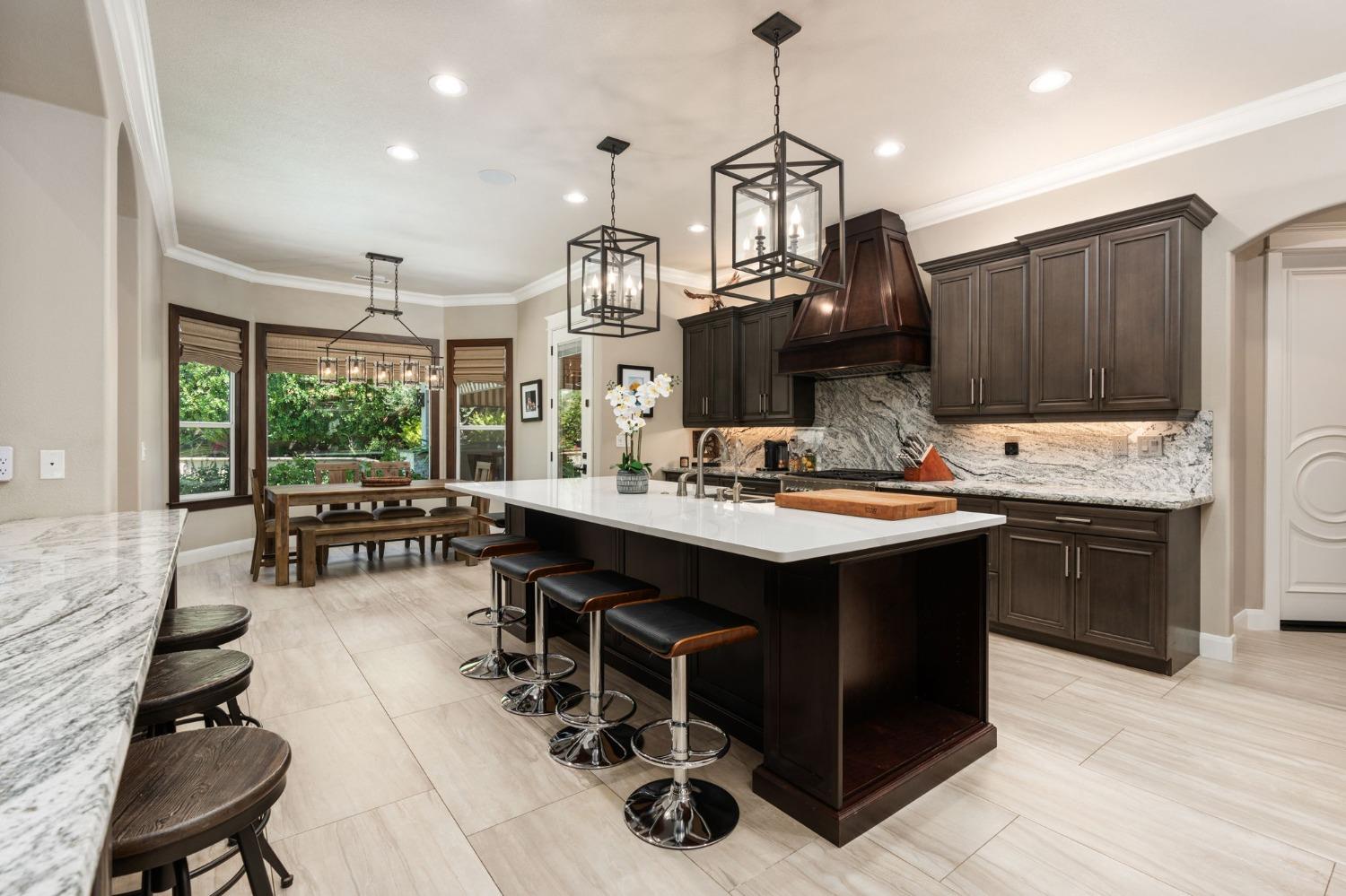 415 Heritage Avenue Clovis, CA 93619 - Photo 8 of 56 a kitchen with a sink cabinets and window