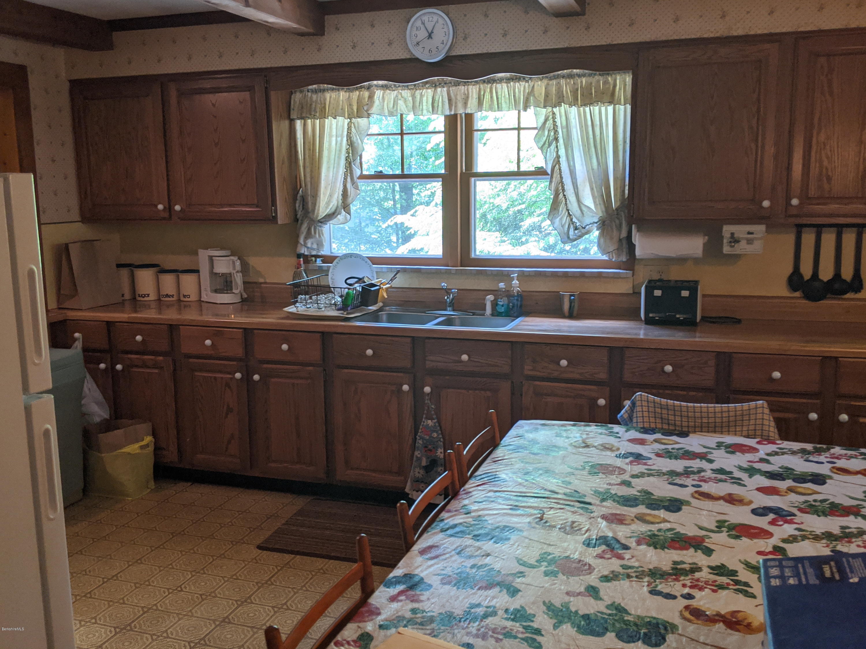 3626 Jacobs Ladder Road Becket, MA 01223 - Photo 18 of 56 a kitchen with stainless steel appliances granite countertop a stove a sink dishwasher and cabinets