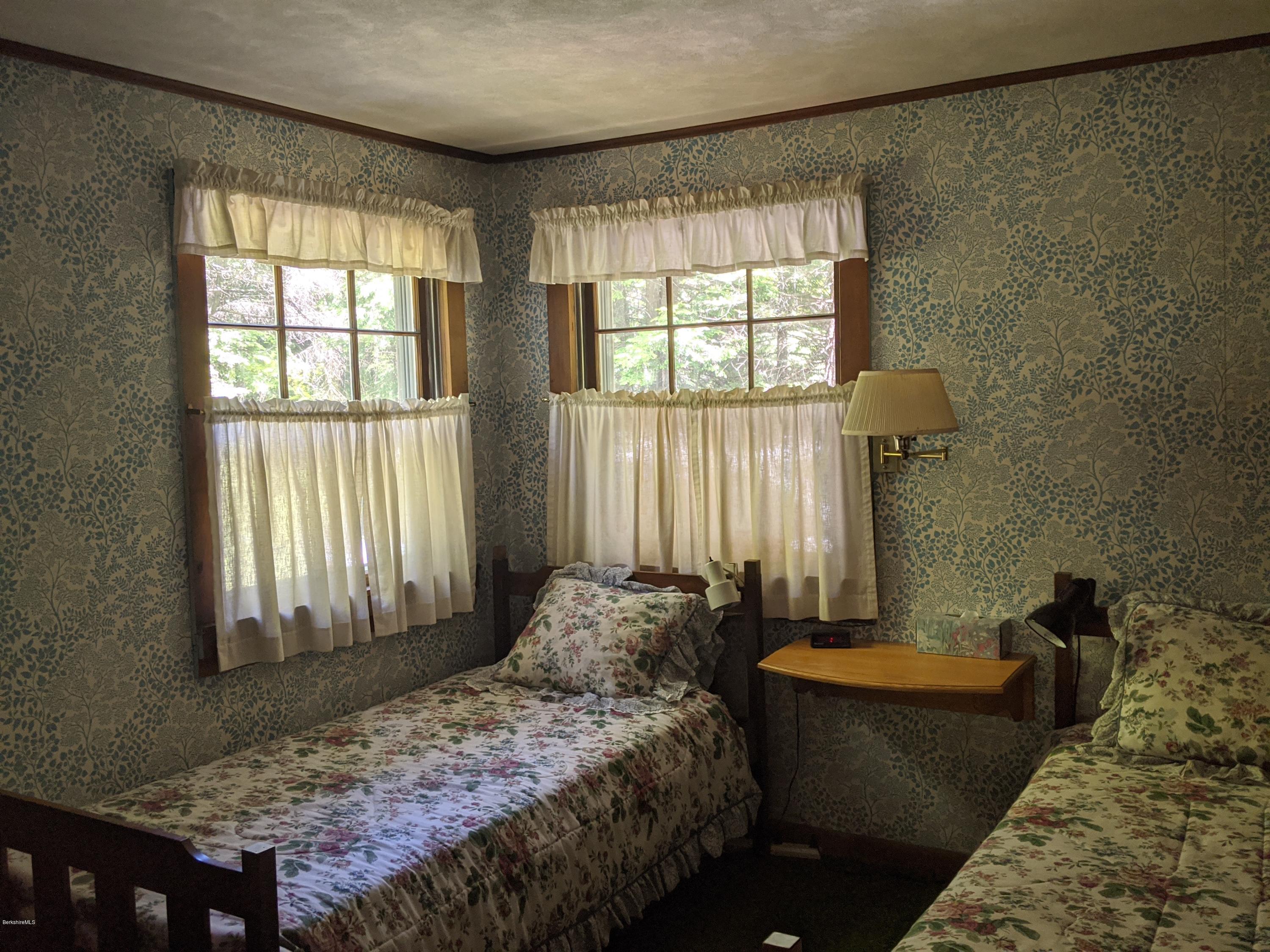 3626 Jacobs Ladder Road Becket, MA 01223 - Photo 21 of 56 a bedroom with a bed and a window
