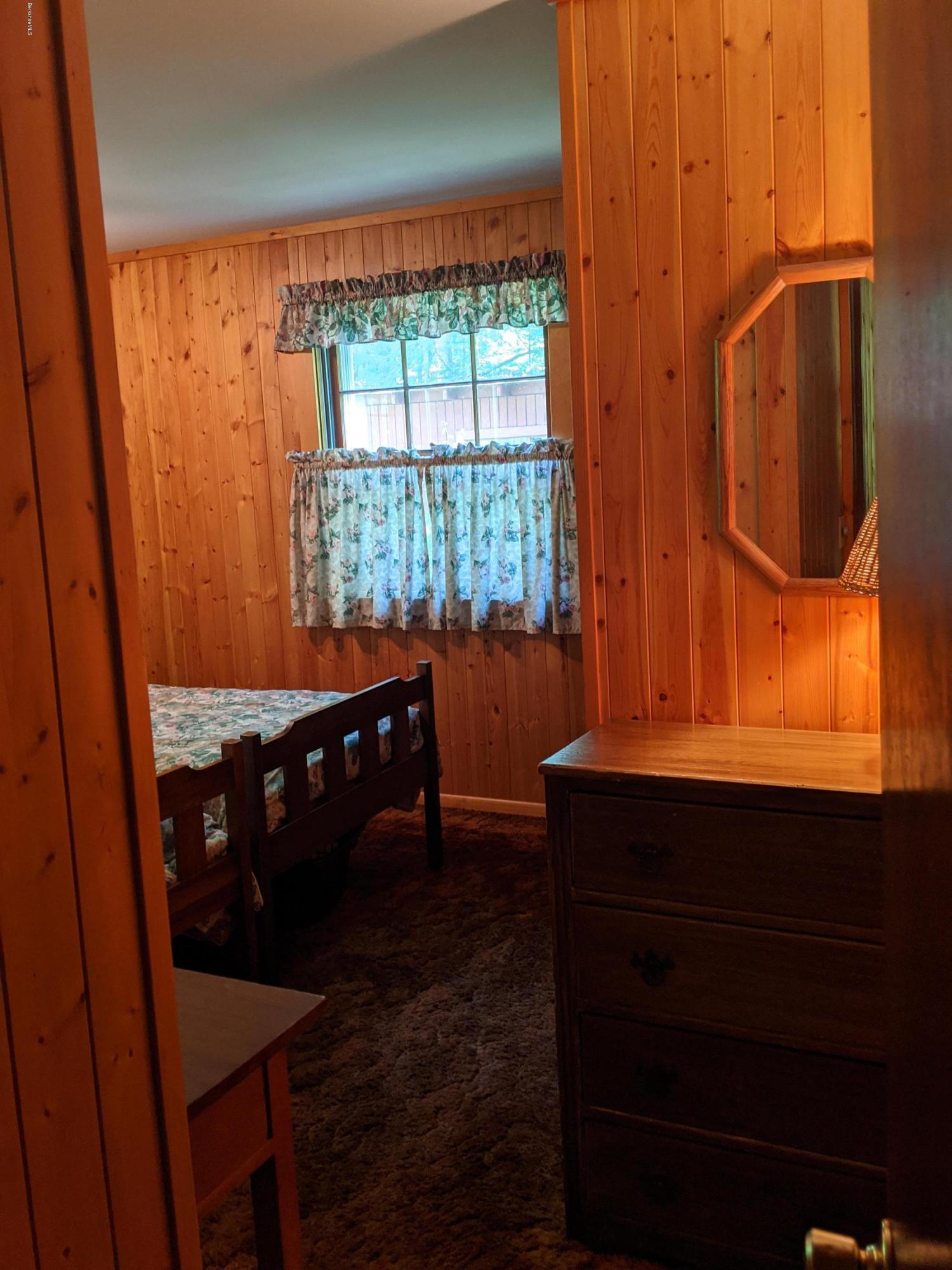 3626 Jacobs Ladder Road Becket, MA 01223 - Photo 23 of 56 a room with workbench and window