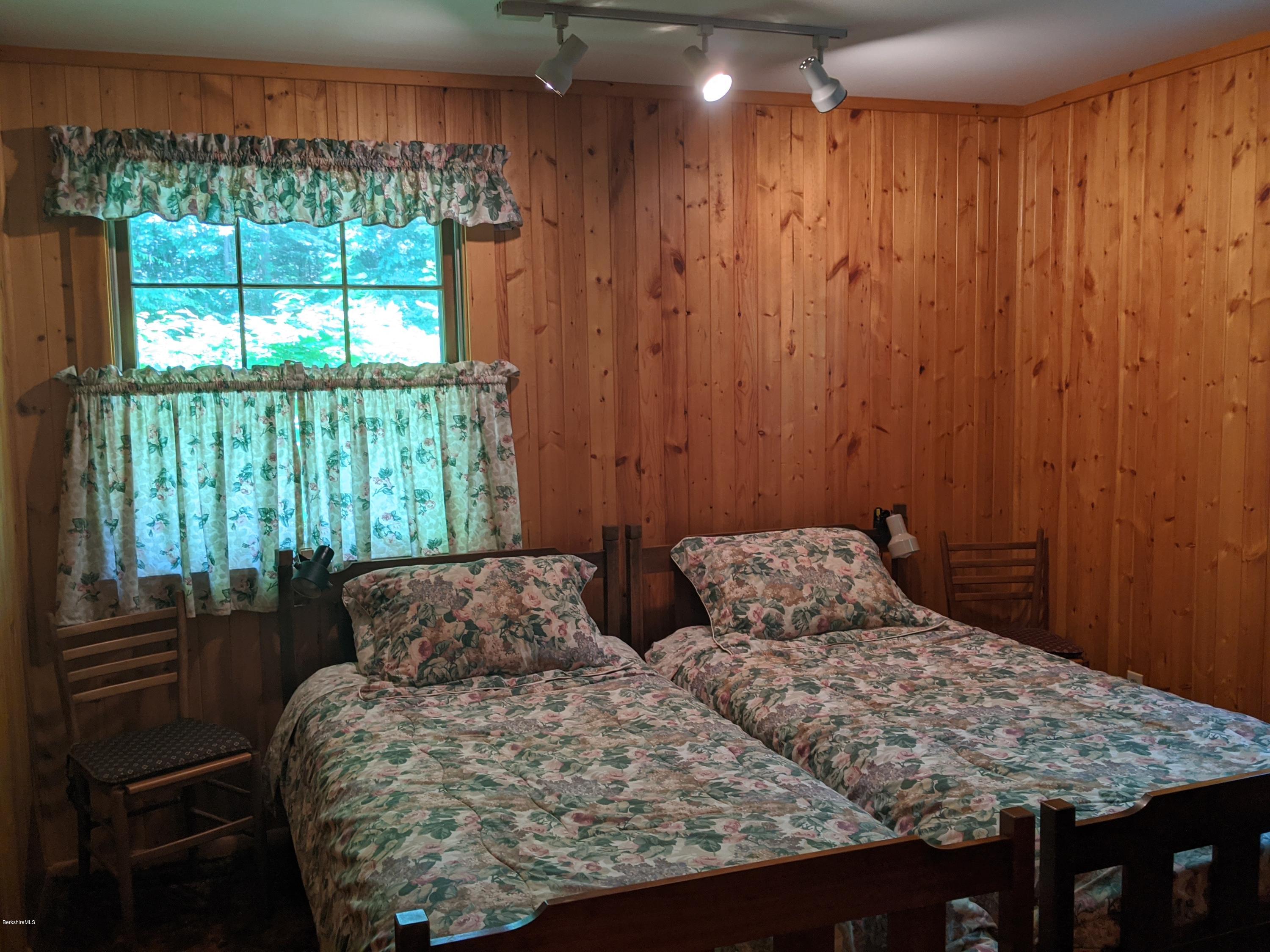 3626 Jacobs Ladder Road Becket, MA 01223 - Photo 24 of 56 a bedroom with a bed and a window