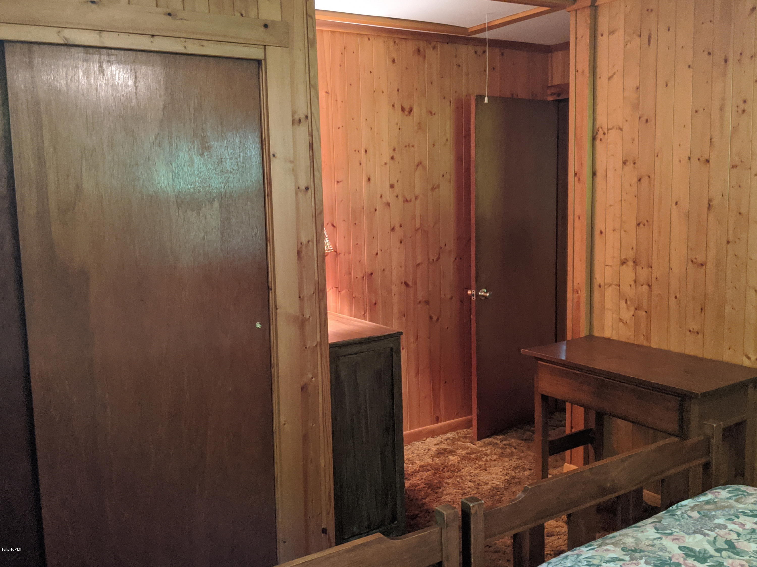 3626 Jacobs Ladder Road Becket, MA 01223 - Photo 25 of 56 a bathroom with a glass door shower and a sink
