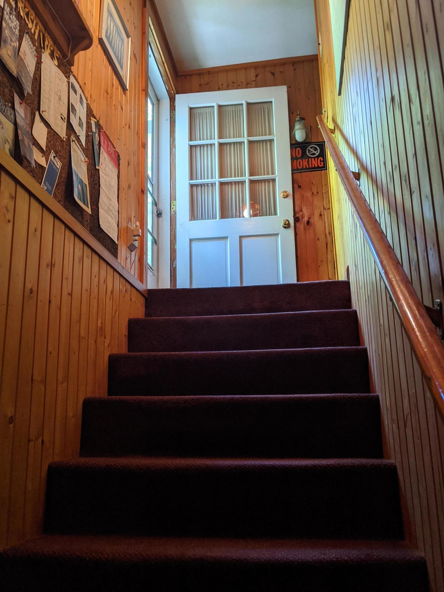 3626 Jacobs Ladder Road Becket, MA 01223 - Photo 27 of 56 a view of entryway with wooden floor and a front door