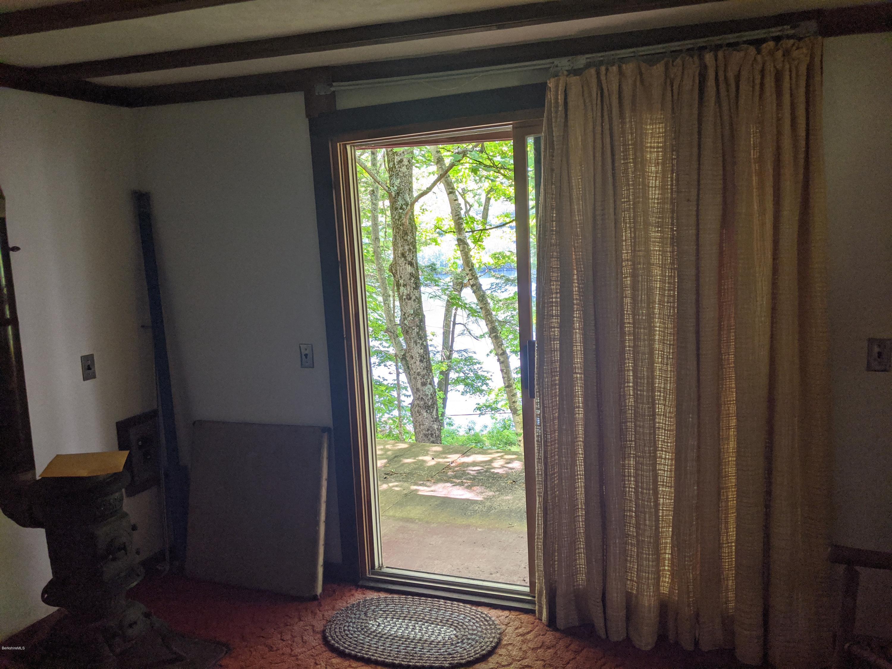 3626 Jacobs Ladder Road Becket, MA 01223 - Photo 48 of 56 a view of back door of a house