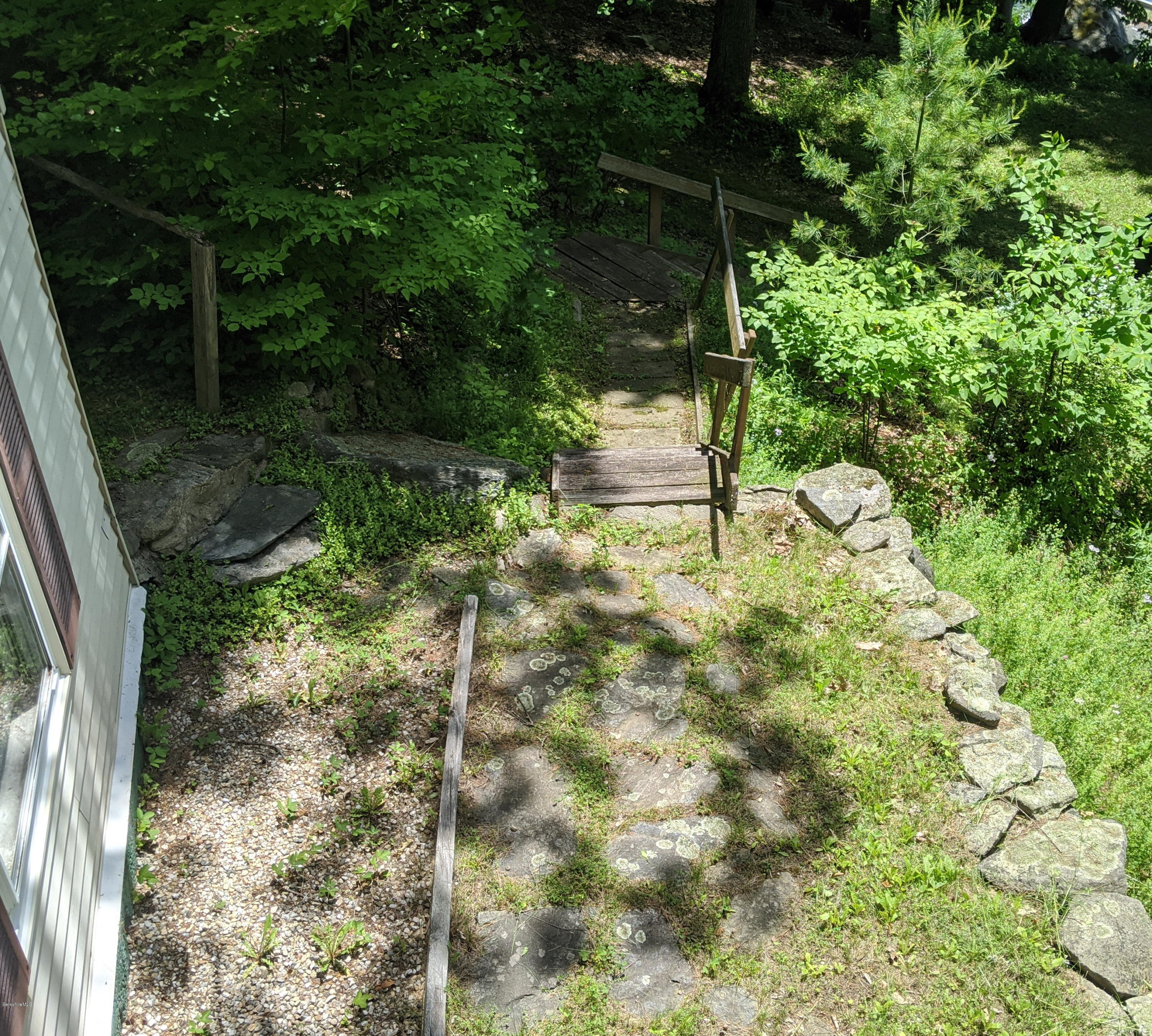 3626 Jacobs Ladder Road Becket, MA 01223 - Photo 8 of 56 a view of backyard with plants and outdoor seating