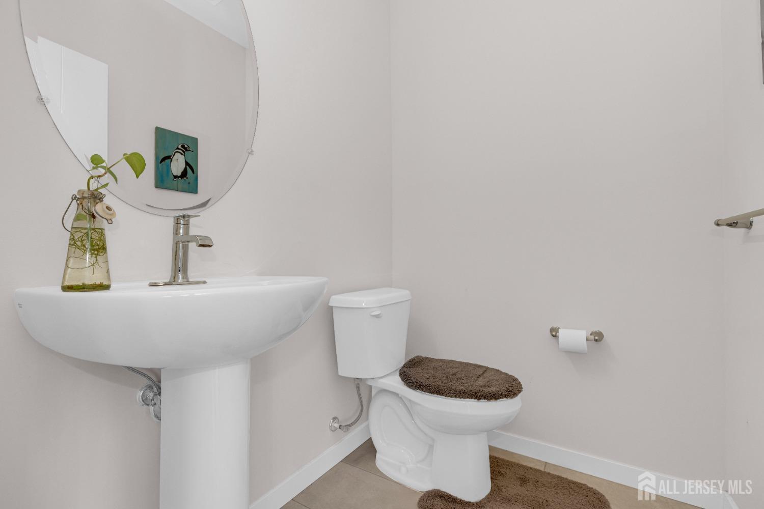 237 Lorhan Drive, Unit 237 Piscataway, NJ 08854 - Photo 27 of 44 a bathroom with a sink and a toilet