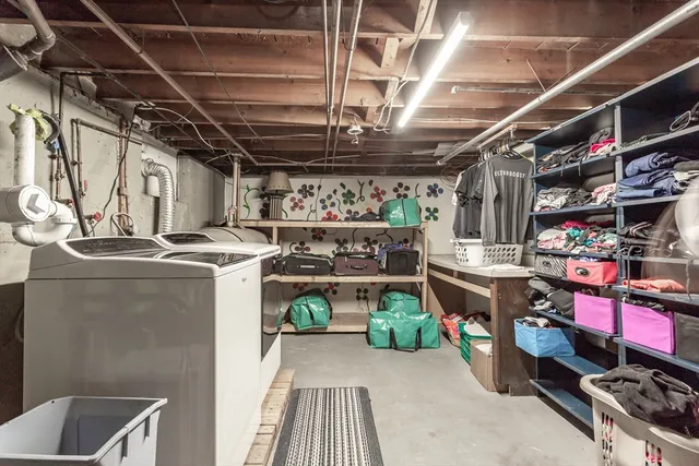 a utility room with washer and dryer