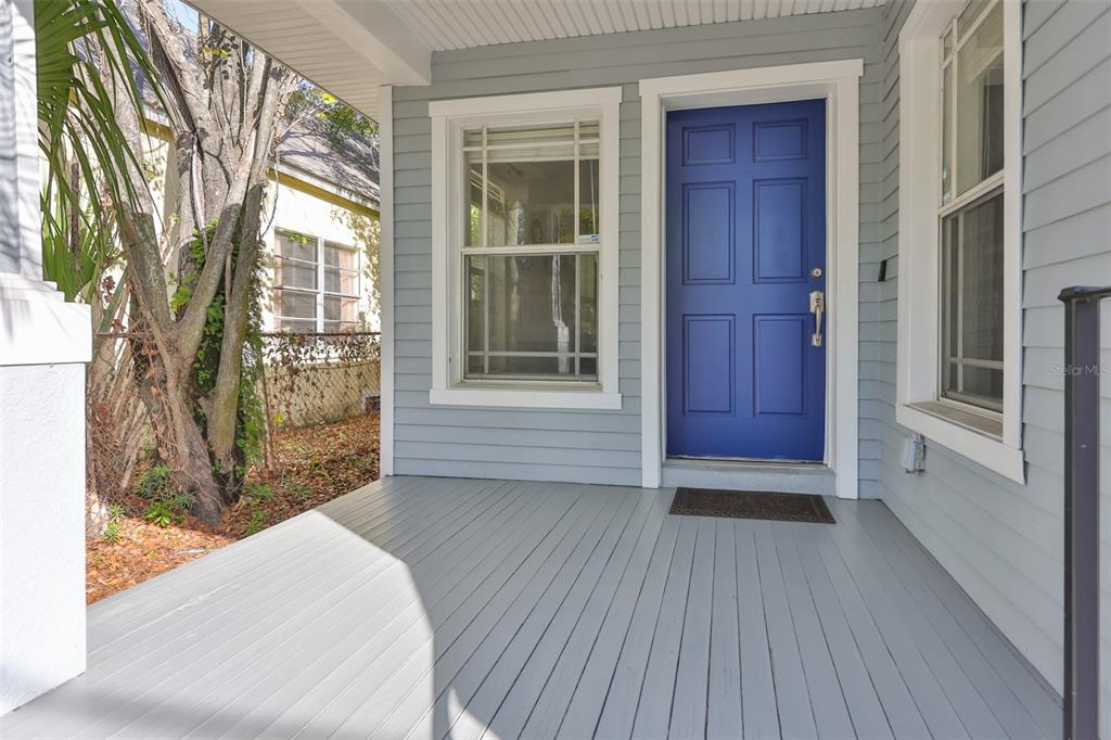 2331 West Chestnut Street Tampa, FL 33607 - Photo 5 of 33 a view of front door of a house with a yard