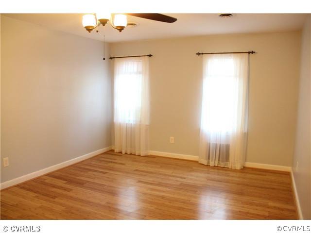 2406 Tanglebrook Road Midlothian, VA 23112 - Photo 12 of 24 a view of an empty room with wooden floor
