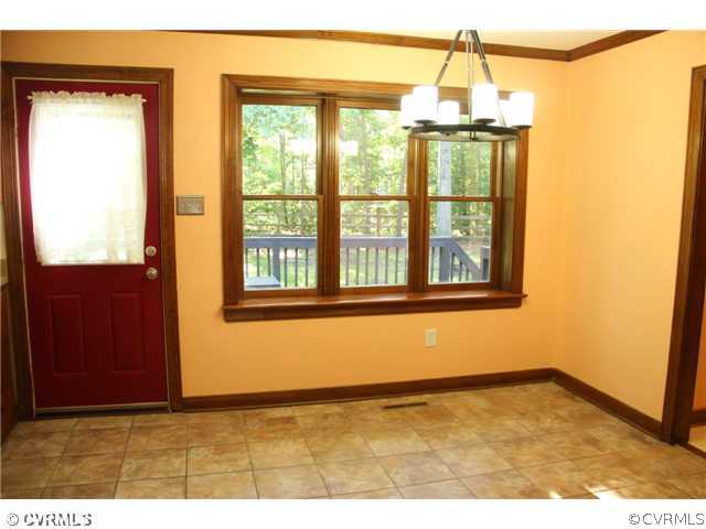 2406 Tanglebrook Road Midlothian, VA 23112 - Photo 7 of 24 a view of an empty room with a window