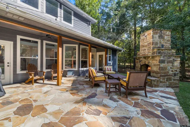 a backyard of a house with seating space