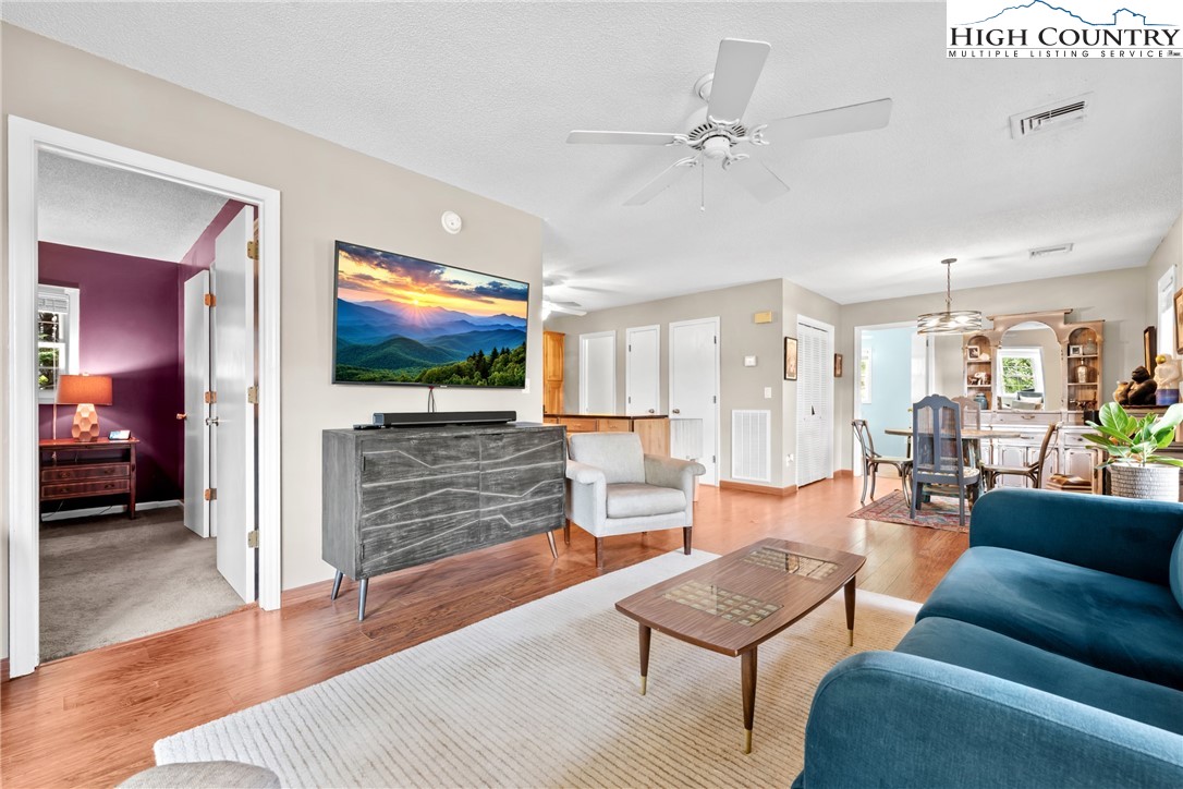 17 Elderberry Loop Newland, NC 28657 - Photo 11 of 47 a living room with furniture and wooden floor