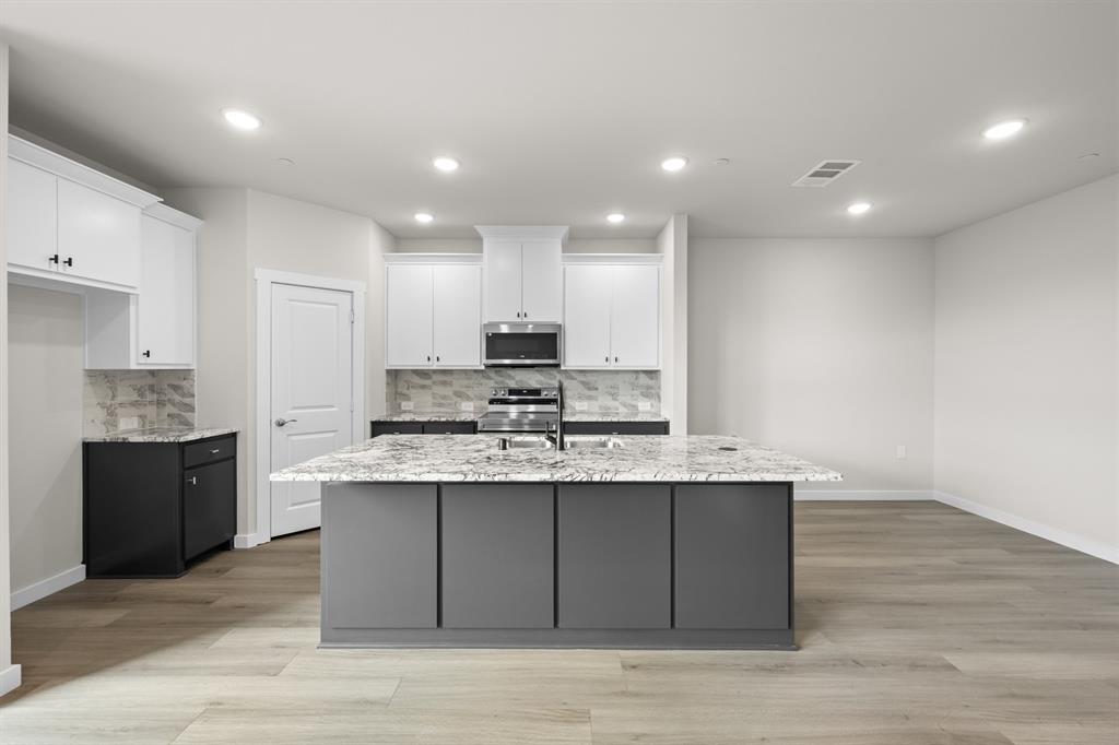 4615 Hawks Trail Oak Point, TX 75068 - Photo 9 of 36 4615 Haws Trail_ 2571_Ivy- Kitchen-1