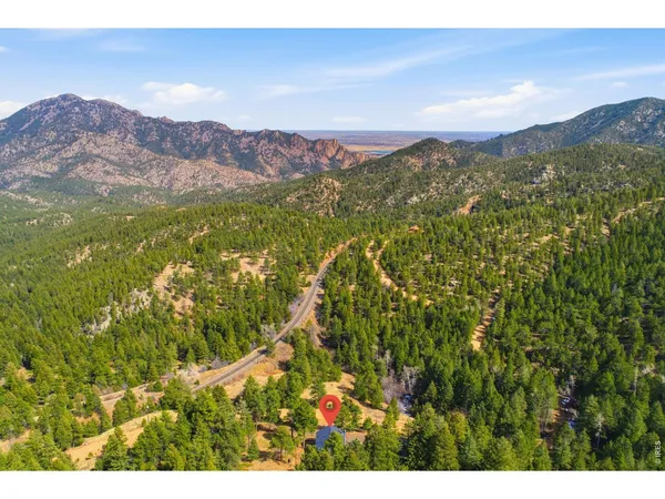 a view of mountains and valleys