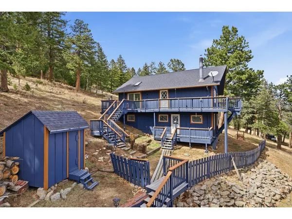 a terrace of a house with outdoor seating