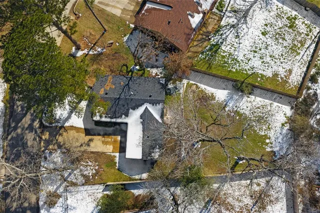 an aerial view of residential house with outdoor space