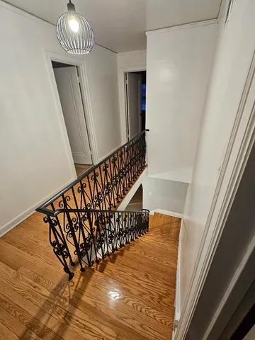 a view of entryway with wooden floor