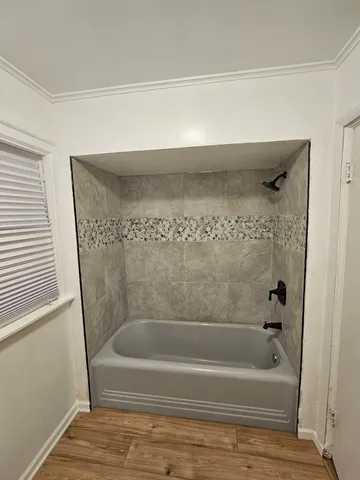 a bathroom with a bathtub