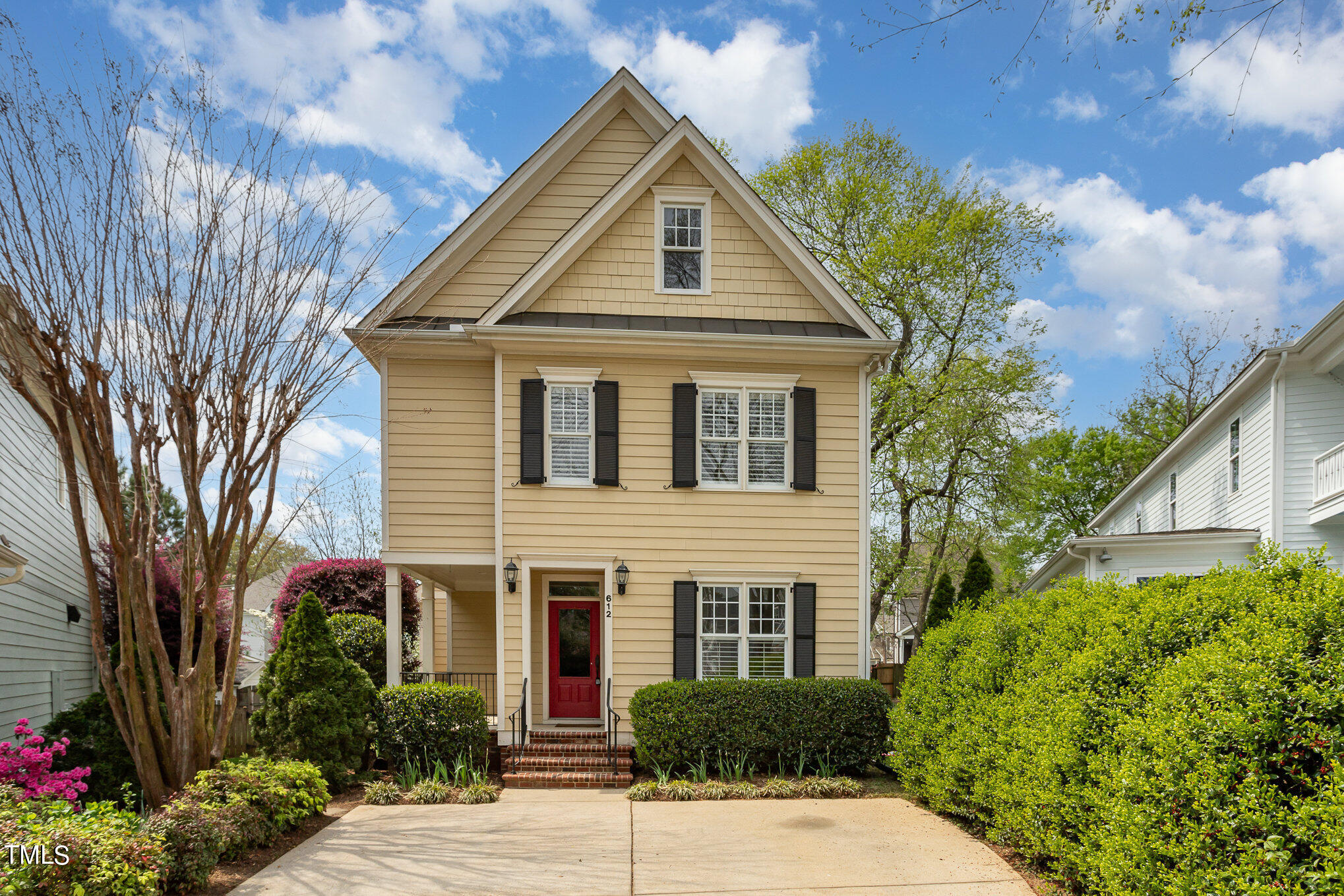 612 New Road Raleigh, NC 27608 - Photo 1 of 12 a front view of a house with garden