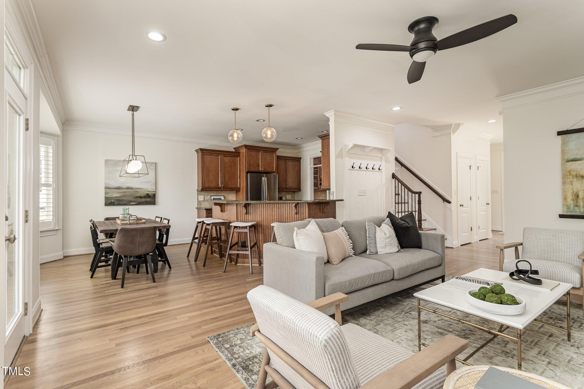 612 New Road Raleigh, NC 27608 - Photo 3 of 12 a living room with furniture and a wooden floor