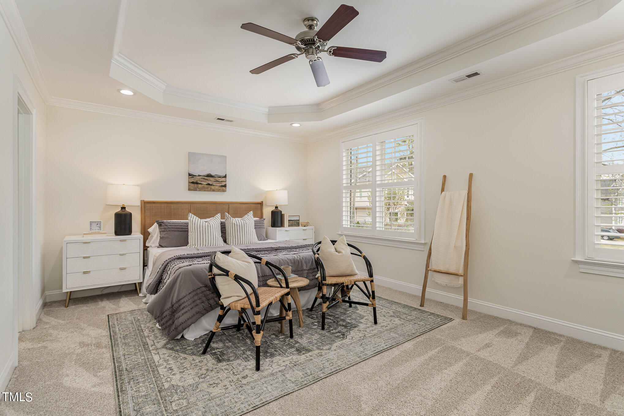 612 New Road Raleigh, NC 27608 - Photo 5 of 12 a bedroom with furniture and a window