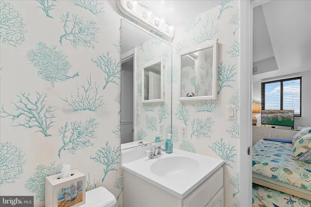 a bathroom with a shower and a toilet