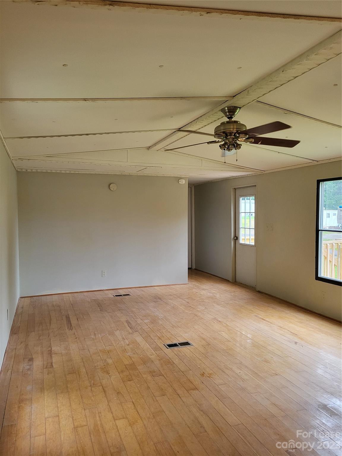 1158 Wagon Wheel Road, Unit 7 Hickory, NC 28602 - Photo 3 of 11 a view of an empty room with a window