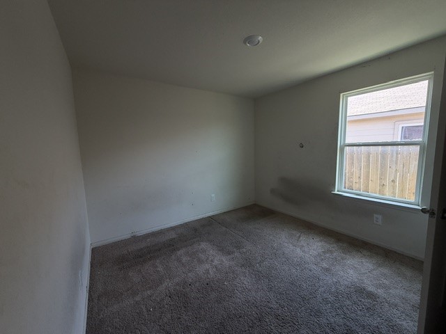 124 Niven Path Jarrell, TX 76537 - Photo 11 of 15 an empty room with a window
