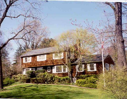30 Ludlow Road Westport, CT 06880 - Photo 1 of 1 a front view of a house with a garden