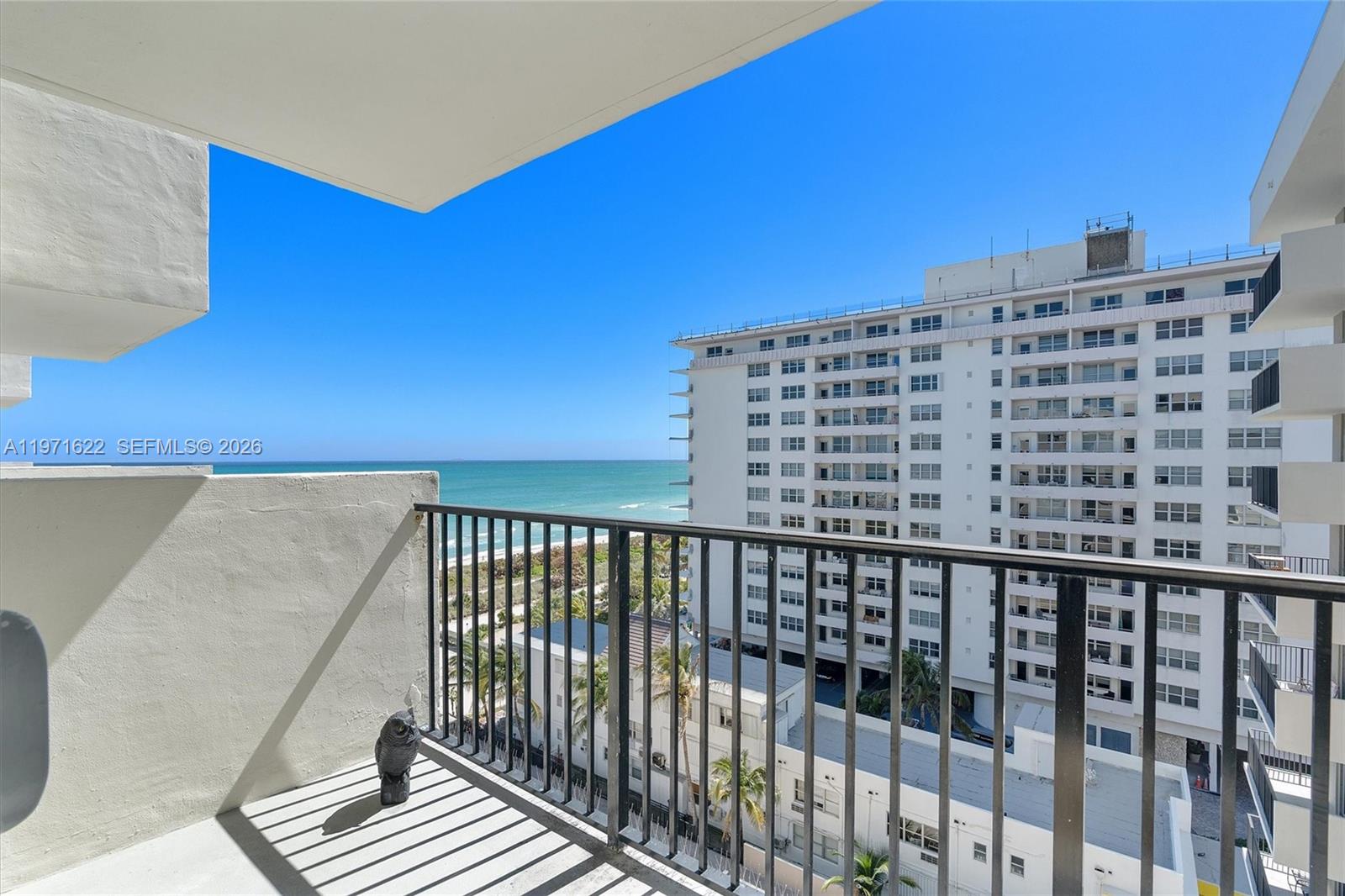9273 Collins Avenue, Unit 901 Surfside, FL 33154 - Photo 13 of 24 a view of a balcony with a floor to ceiling window