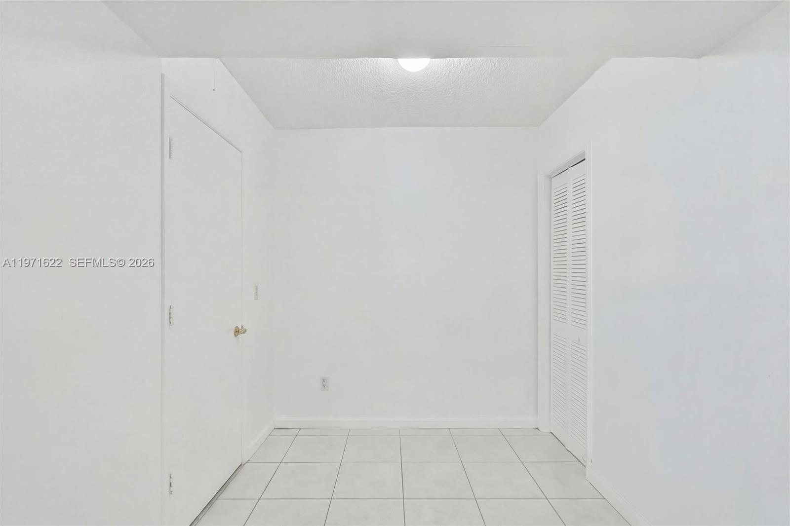 9273 Collins Avenue, Unit 901 Surfside, FL 33154 - Photo 15 of 24 a view of an empty room