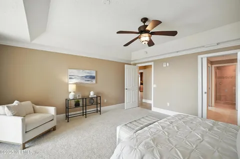 a bedroom with a bed furniture and window