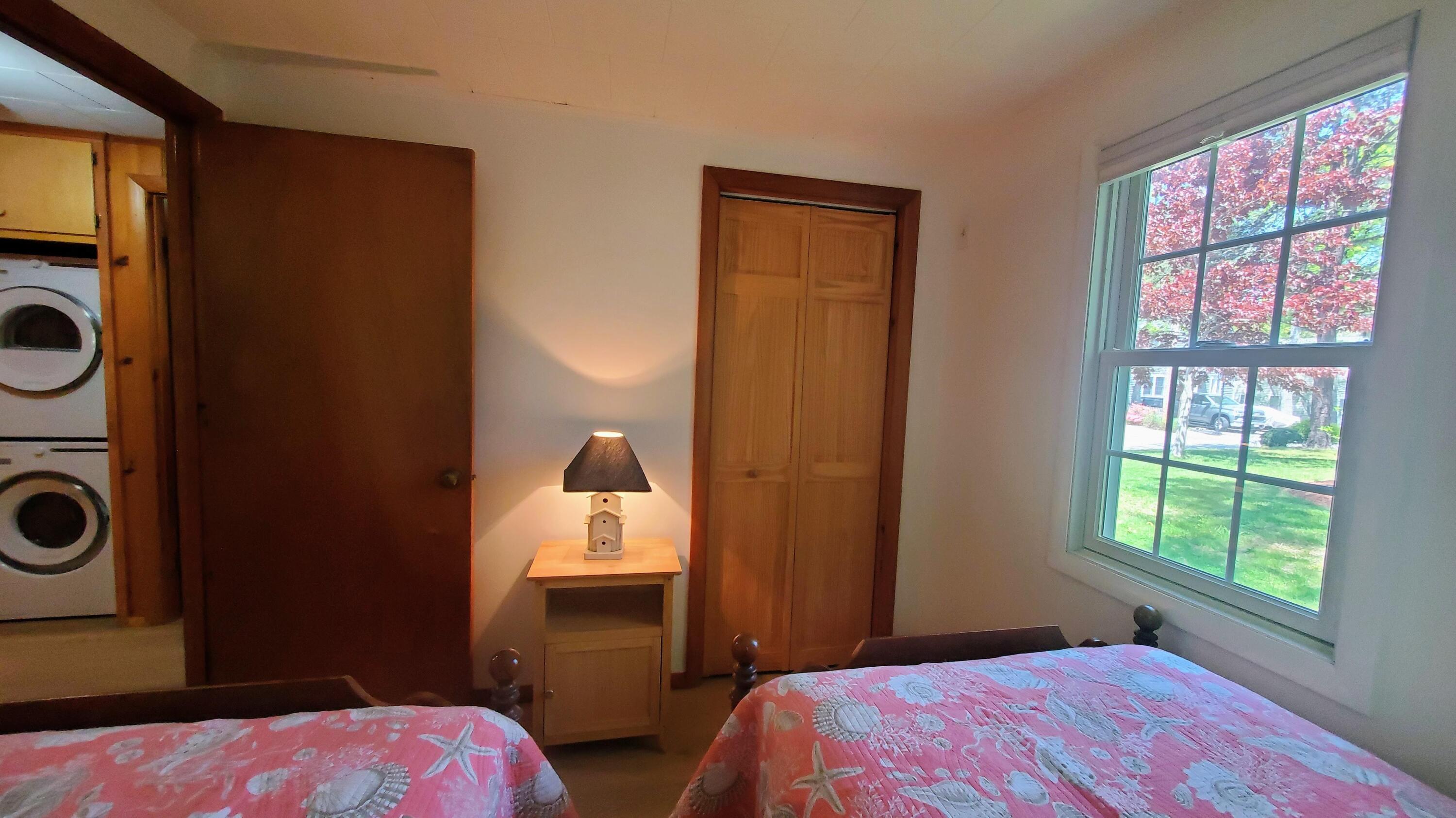 66 Uncle Edwards Road Mashpee, MA 02649 - Photo 14 of 18 a bedroom with a bed and a window