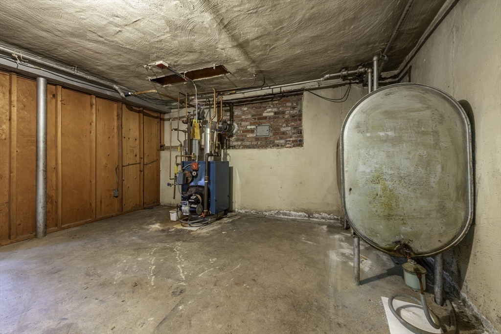 41 Squire Road Winchester, MA 01890 - Photo 22 of 25 a view of a room with wooden walls and furniture