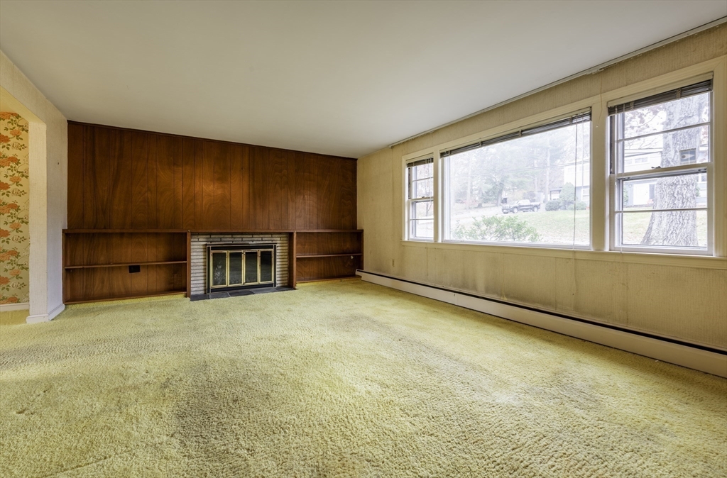 41 Squire Road Winchester, MA 01890 - Photo 6 of 25 an empty room with windows
